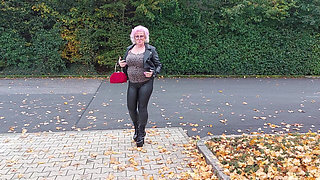 Naughty Granny Tongue Out Flashing Big Tits in Public
