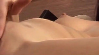 Sasha Rose masturbates on the table with really huge toy