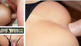 Redhead ladyboy in black fishnet stockings jerks off her