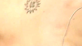 Seductive Brunette Gets Wild on the Couch