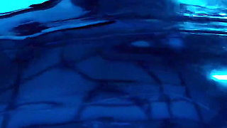 Tied up rubber girl in catsuit fucking herself