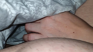 Step mom surprised step son by pulling out his dick under blanket and handjob his cock