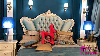 Stretching Flexibily on Hotel Bed