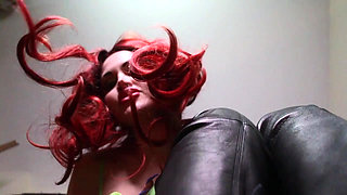 Redhead Italian mistress in black boots humiliates you