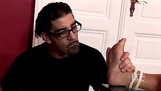 Bad guy pouring hot wax on hot babe