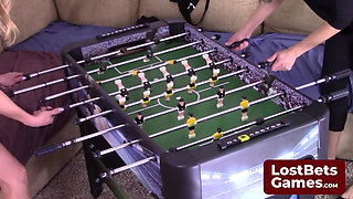 Two Best Friends Navigate This Comedic Strip Foosball Game