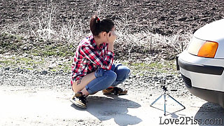 Peeing in Front of a Car, on the Side of the Road