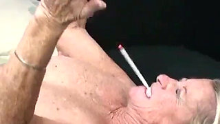 Mean and nasty stepgrandma smokes and fucks stepgrandson while busting balloons