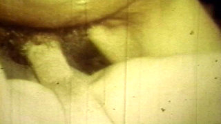 Worn Sepia Loop Captures Curly Retro Couple in Raw Bedroom Passion