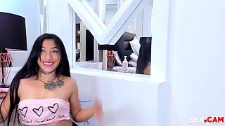 Young Latina On The Floor Makes Sexy Moves While Shaking Her Ass And Dancing