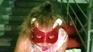 Milk enema for dirty slut on the stairs