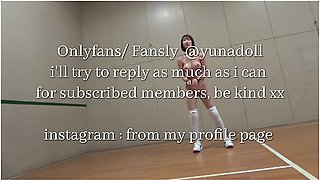 Japanese Student Practice Volleyball With Her Strict Coach At The Gymnasium