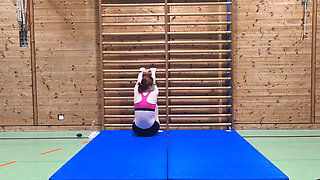 Kinky girl fucks a dildo in the school gym