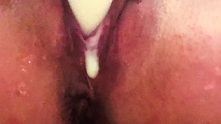 Fuck slut masturbates and squirts with dildo