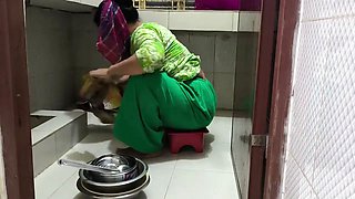 I suddenly see my aunty cleaning the dishes in the house