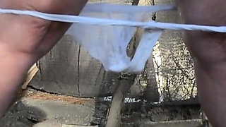 Pissing White Knickers Outside in Bondage