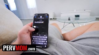 Step mother is lounging in couch with a night mask when stepson enters and begins rubbing her boobs
