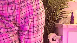 Emily pissing in the bathroom