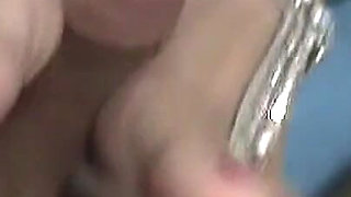 Andrea in Homemade Footjob POV