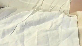 She's bound on a bed, throated and pussyfucked by a big cock with no mercy