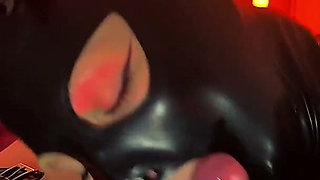 Naughty Doll Wearing a Latex Mask Gave Her Master Blowjob