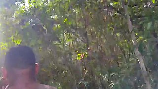A blonde with a beautiful butt and big tits was fucked by two black friends in the forest
