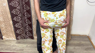 Two lovers have sex by the window