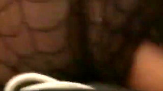 Busty brunette Chloe James strips in lingerie in front of a camera