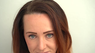 Extreme Close up Blue Eyed Redhead Smoking