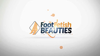 Sexy brunette ambra plays with her sexy feet outdoors