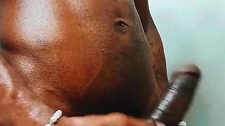 Oiling up My Big Black Cock