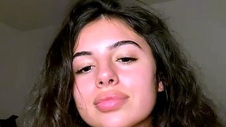 Amateur young brunette enjoys dildo on solo masturbation