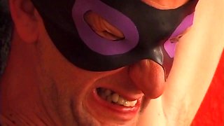 Big-Tits Blonde Dominatrix Spanks Bound Masked Guy