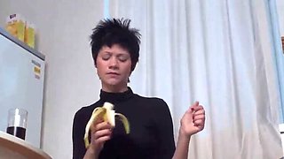 Hot teen obeys her mistress and eats banana off the floor
