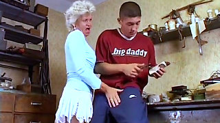 Horny granny knows how to seduce young man to fuck her