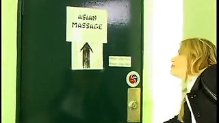 Asian Lesbian Chick Takes a Blonde Babe Customer for Massage and Ends up Fingering Her Cunt