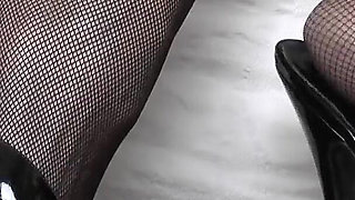 Goddess of High Heels Shows off Her Black Patent Leather Mules