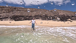 Girl Wetting Jeans in the Ocean and Swimming in Wet White T-shirt