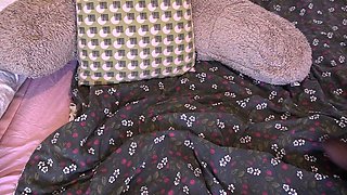 In a kitchen a sexy brunette playing with her big boobs