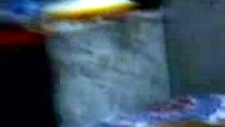 Anisha masturbates while wearing batik cloth