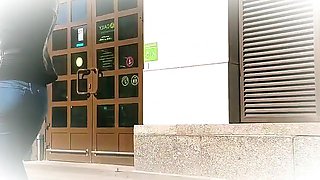 Seductive teenage Beurrette teases her booty during candid street masturbation