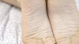 Blonde MILF Teases with Her Perfect Feet